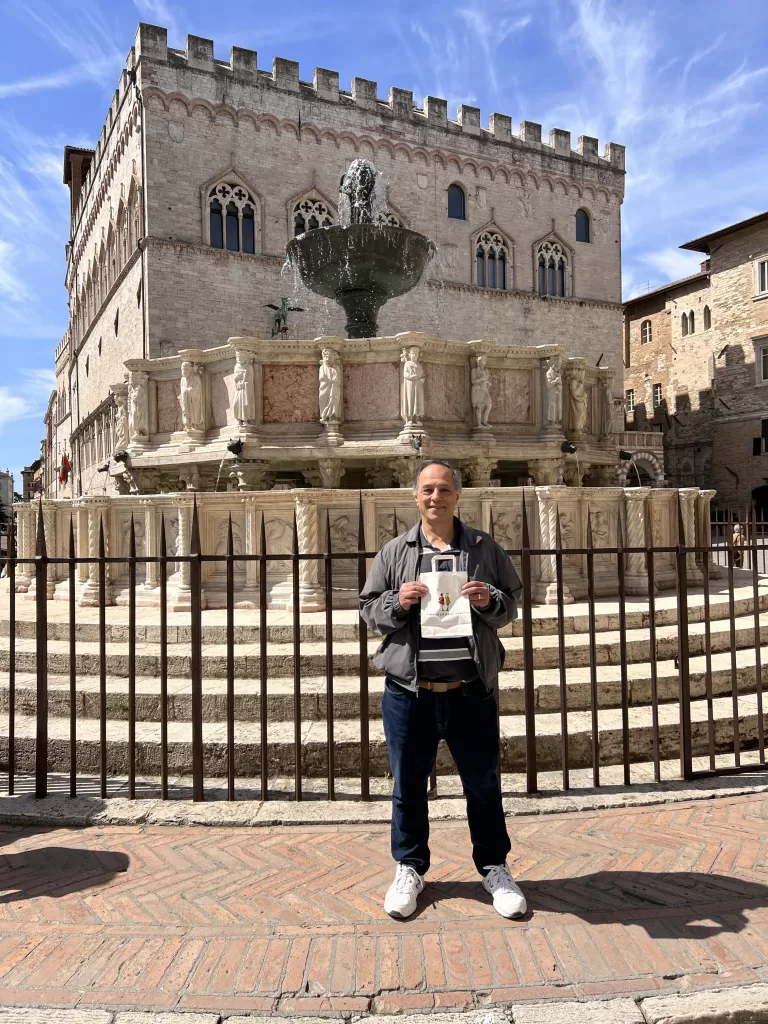 at the Fontana Maggiore in Piazza IV Novembre with bag of Perugina chocolates