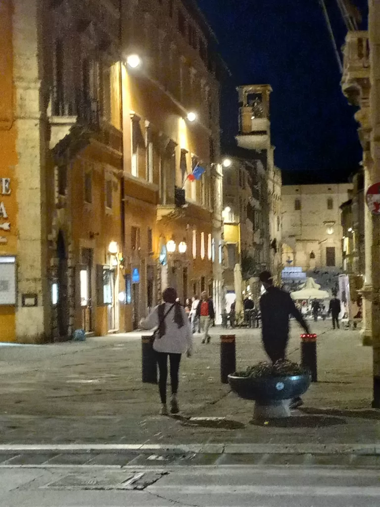 strolling along Corso Vanucci toward Piazza IV Novembre in Perugia, Italy