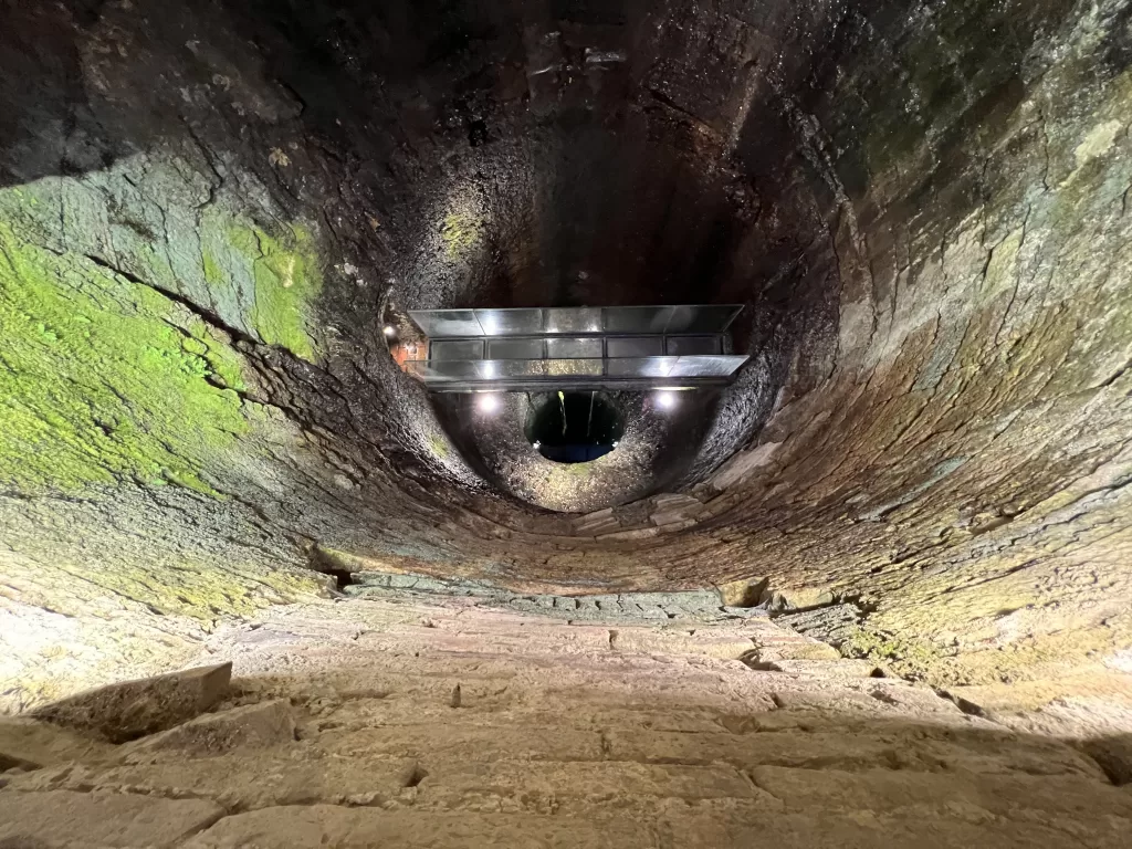 Looking down into the ancient Pozzo Etrusco in Perugia, Italy